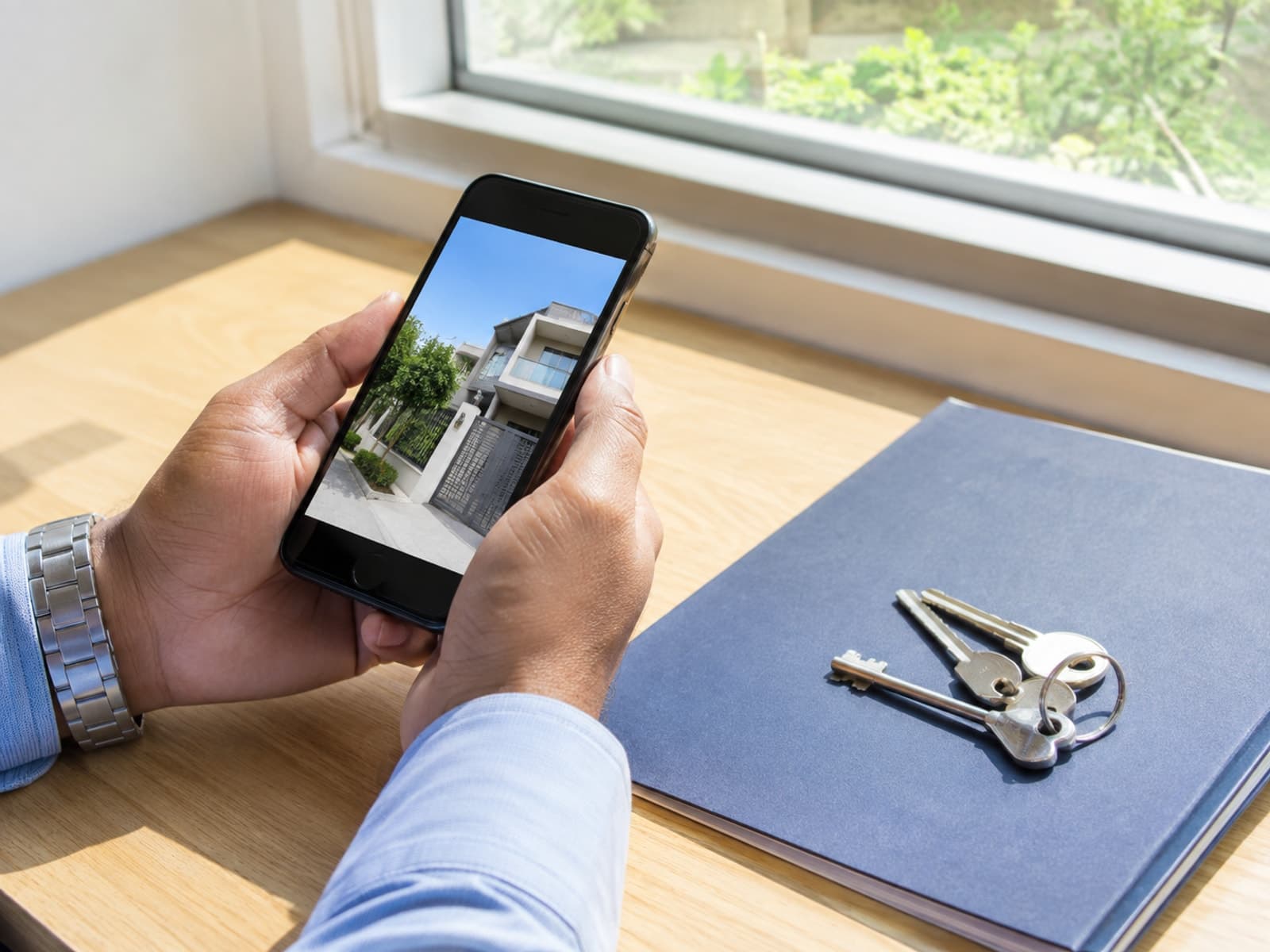 A phone, house keys and property documents
